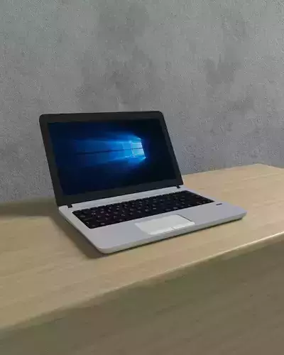 Laptop on wooden table