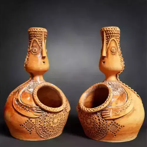 Penholder old vase with face