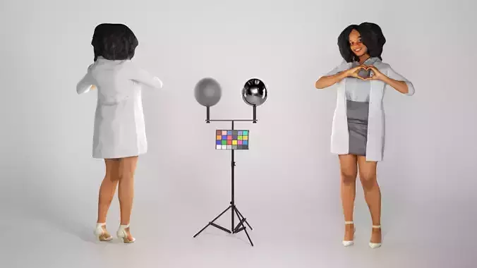 Woman in medical gown making a heart symbol with her hands 231