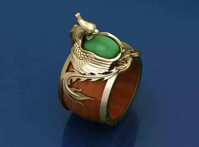 Phoenix emerald and gold ring