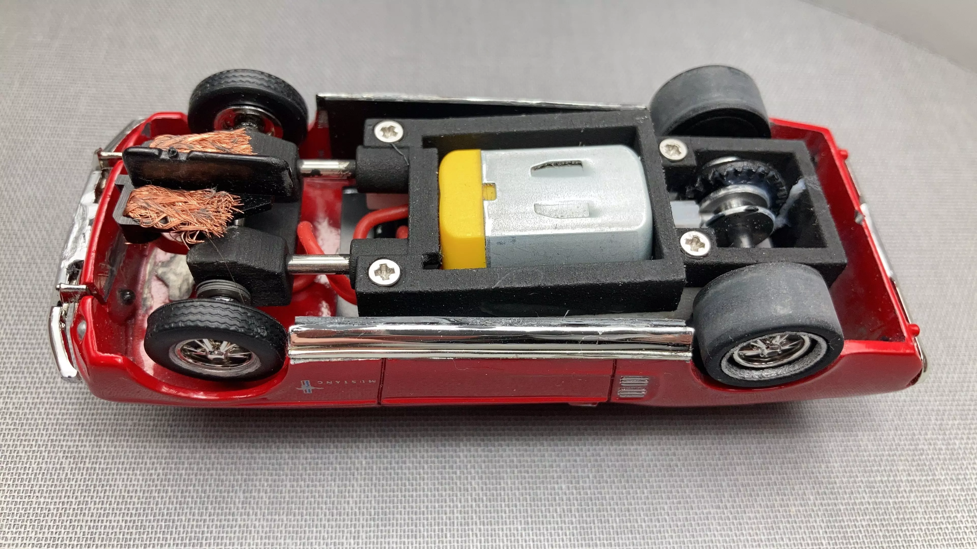 adjustable slot car chassis 3D print model_0