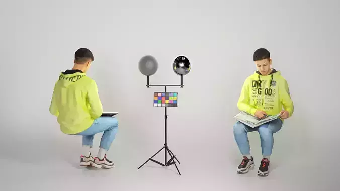 Young man sitting in chair reading book 226 Low-poly 3D model