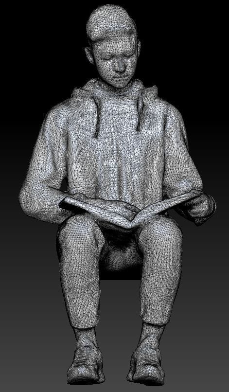 Young man sitting in chair reading book 226 Low-poly 3D model_7