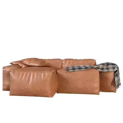 Frameless sofa with pillows and blanket