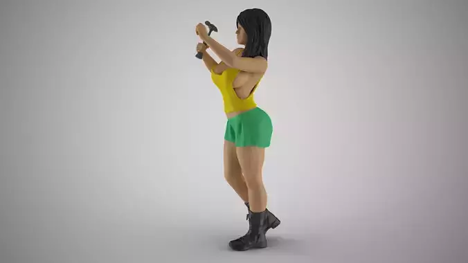 Woman Hammering Nail on Wall