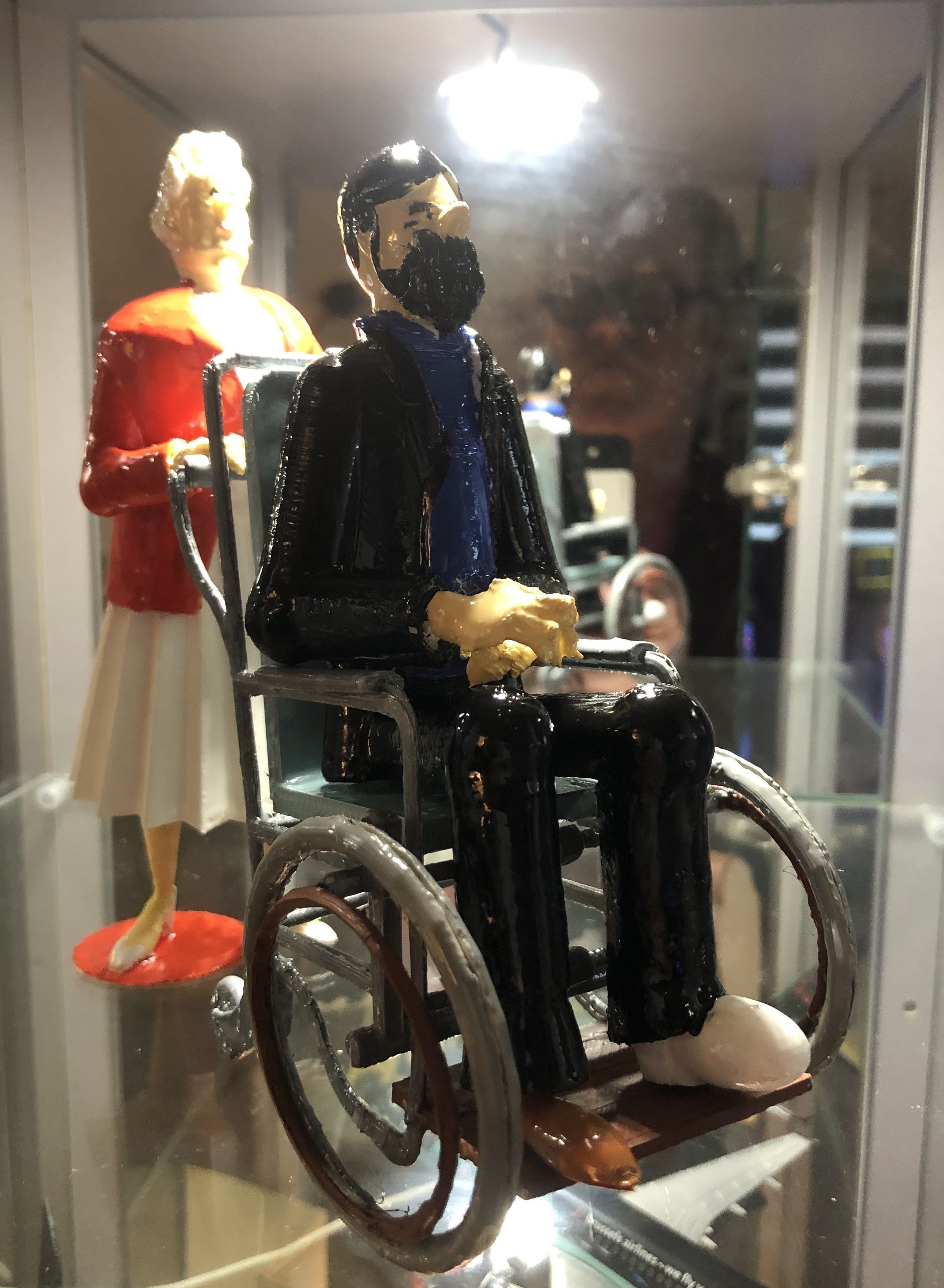 Captain Haddock in wheelchair pushed by Bianca 3D print model_1