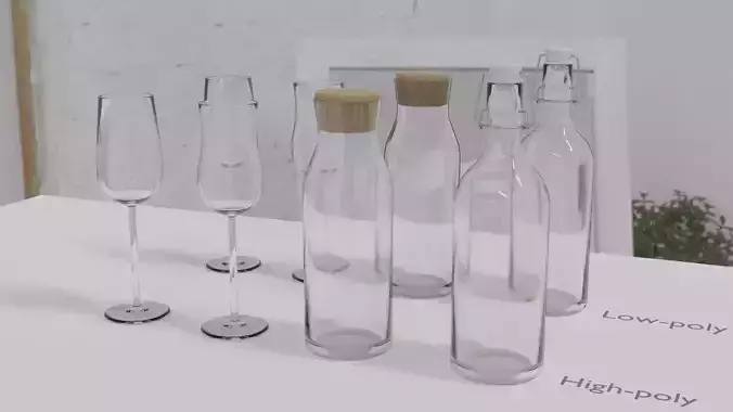 Glass set of glasses and bottles on table