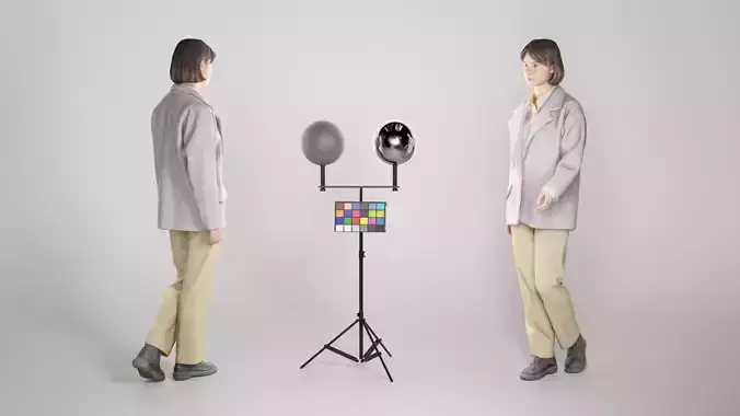 Young woman in grey jacket walking 251