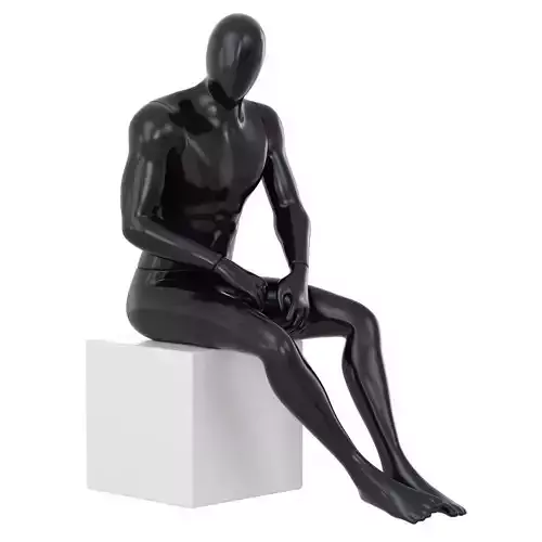 Black mannequin sitting on a white stool 68