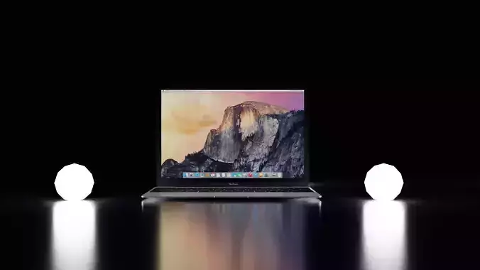 Macbook laptop on table with two light bulbs
