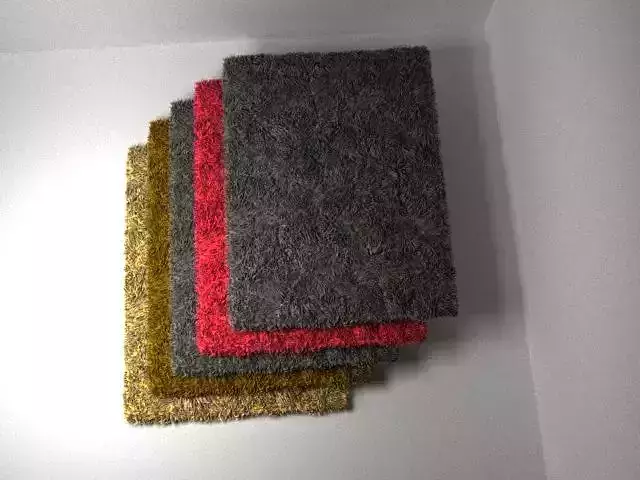 The Rug four different colored carpets hanging on wall