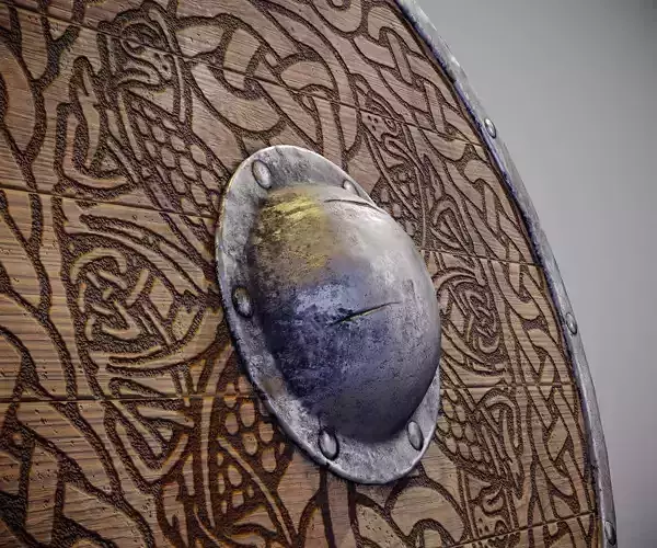 Round shield with carved nordic ornament