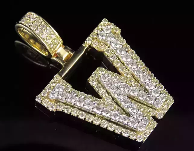 Latter W letter pendant gold with diamonds