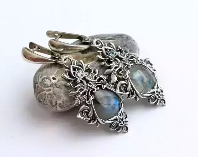 Dangle earrings with intricate pattern in fantasy style