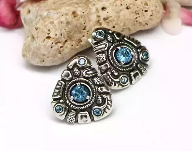 Triangular earrings with round stones and latch-back closure