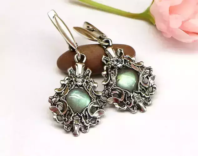 Dangle earrings with complex pattern in fantasy style