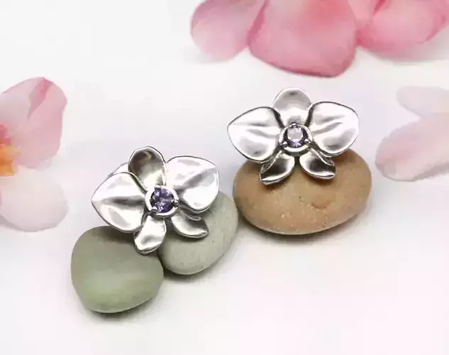 Stud earrings model in the form an orchid flower