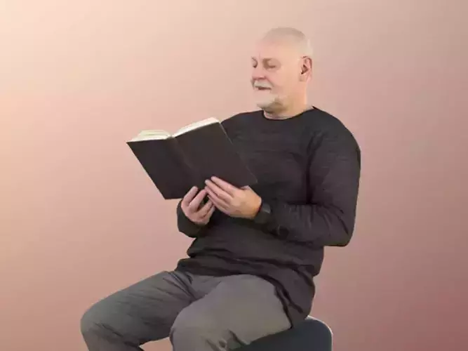 Phil 11249 - Old Man reading book sitting