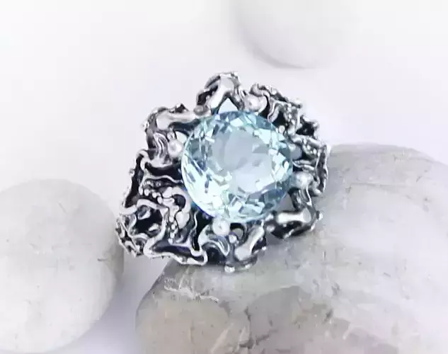 Sculpted ring in a fantasy or vintage style