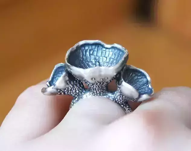 Ring in the form of woodland plants or mushrooms