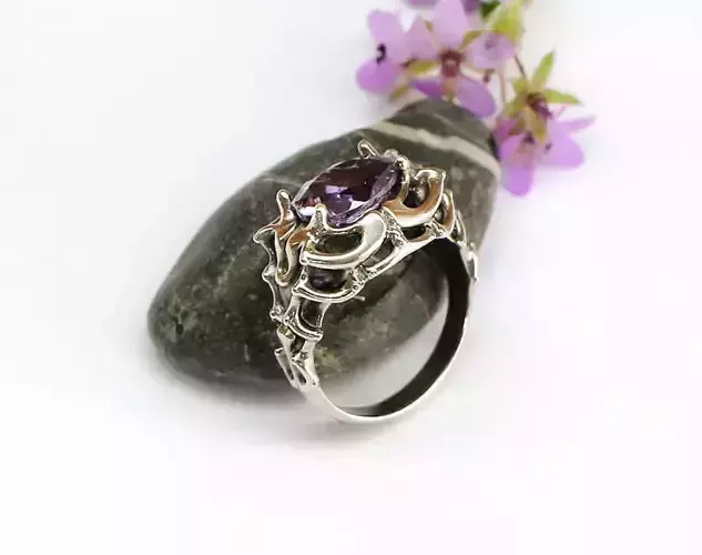 Sculpted ring in a fantasy or vintage style