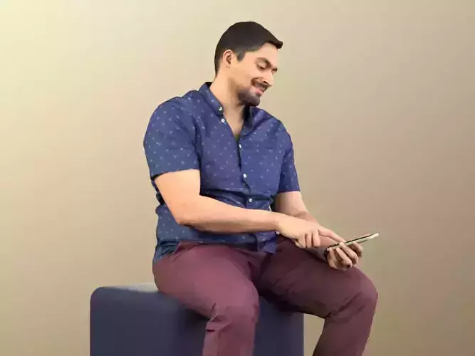 Sahir 11004 - Casual Man sitting with mobile phone