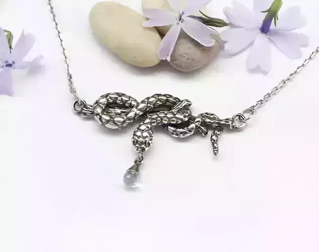 Snake pendant model with a briolette stone