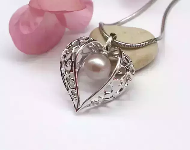 Physalis pendant model with opework pattern and a pearl
