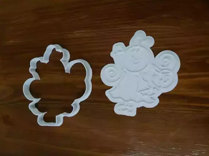 Baboca two cookie cutters on wooden table