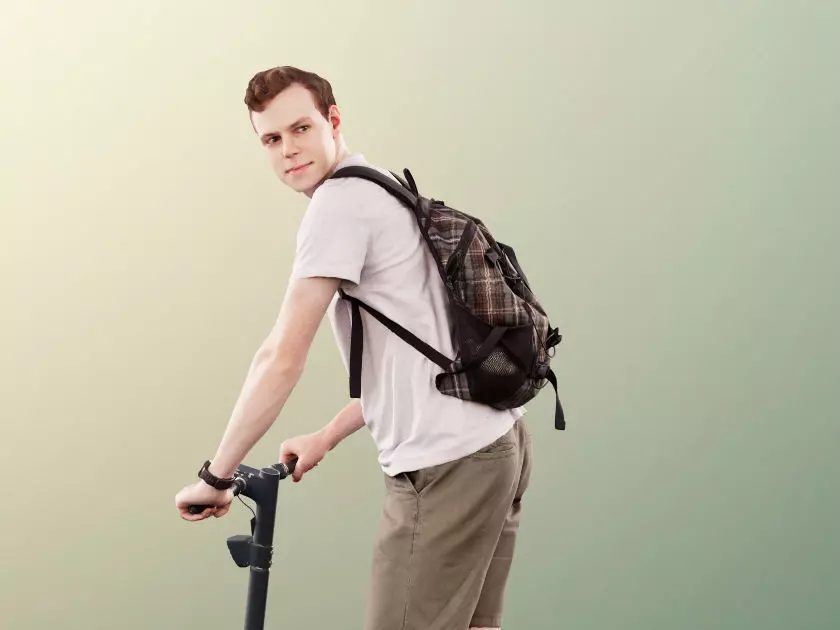 Dominik 11302 - Casual Man With Bag On Scooter Looking Back 3D model_0