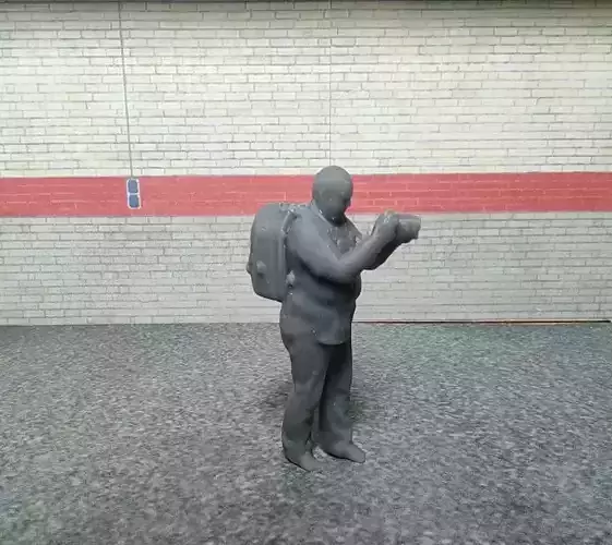 CAMERAMAN man with brick wall