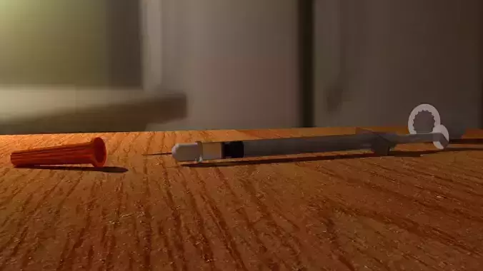 Syringe on table