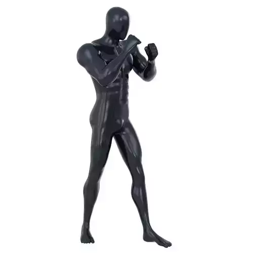 A male mannequin stands in a boxer pose 153