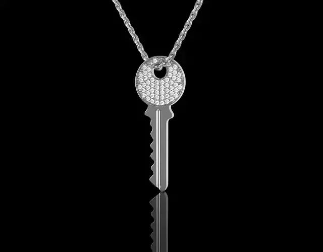 Diamond pave key pendant 