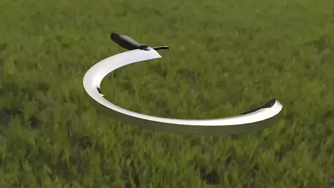 Sickle metal ring in middle of field