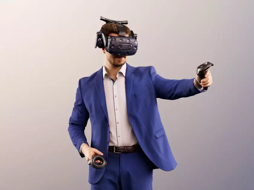Kilian 11587 - Man In Blue Suit With VR Headset And Controller 3D model_0