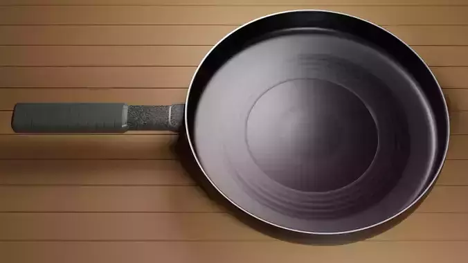 skillet frying pan on wooden table