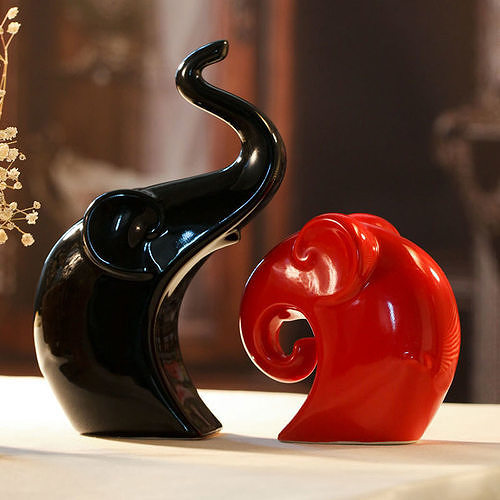 Elephants two elephant figurines on table 3D print model