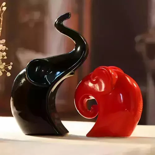 Elephants two elephant figurines on table 3D print model