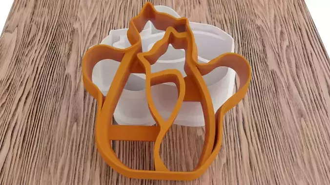 Two kittens in love for the 3D printer