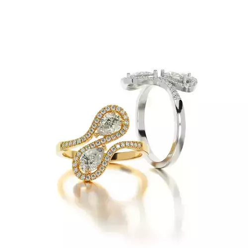 gold diamond ring with pear shape stones