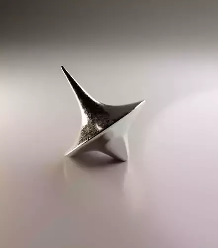 Spinning top from inception with metallic texture