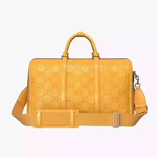 Gucci GG embossed duffle bag yellow
