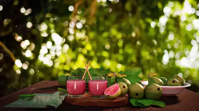 Guava fruit and juice on wooden table