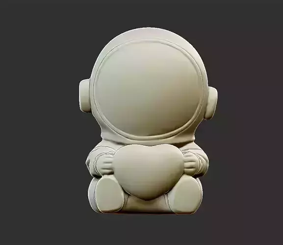astronaut figurine holding heart