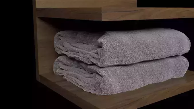 Towels two stacked on wooden shelf