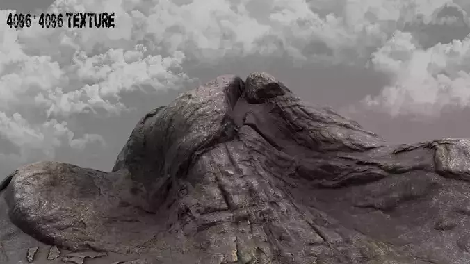 Rock mountain with clouds in sky