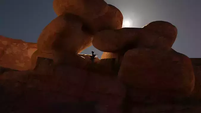 sword moon over rock formation at night