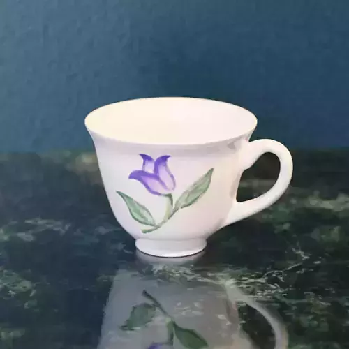 Cup with flower pattern Free low-poly 3D model