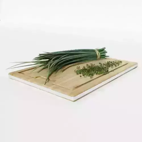 Chives On Wooden Cutting Board
